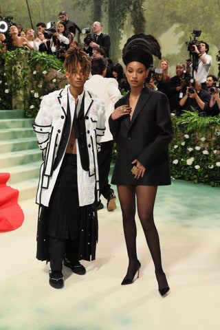 Image may contain Willow Smith Jaden Smith Person Clothing Footwear High Heel Shoe Adult Coat and Camera