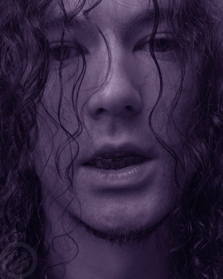 Image may contain: Face, Head, Person, Photography, Portrait, Adult, Body Part, and Mouth