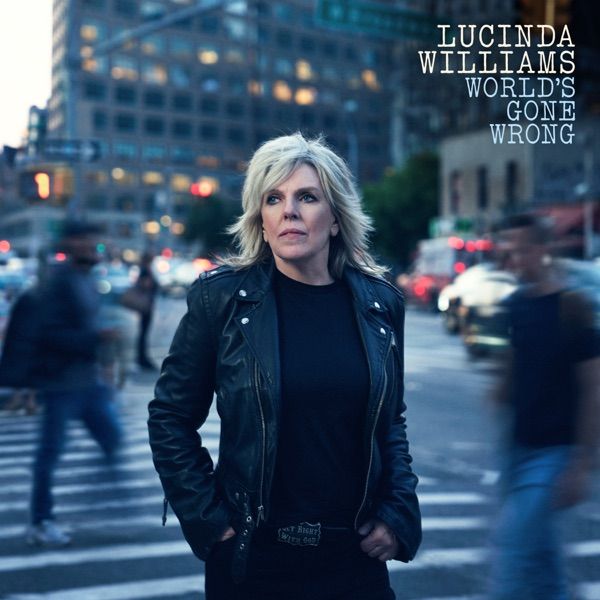 Image may contain Lucinda Williams Clothing Coat Jacket Blonde Hair Person Face Head Photography and Portrait