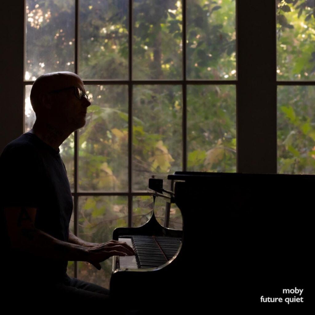 Image may contain Moby Keyboard Musical Instrument Piano Leisure Activities Music Musician Performer and Person